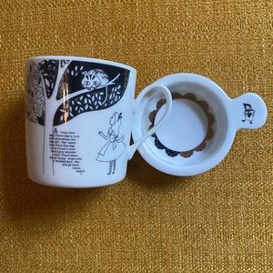 Alice in Wonderland tea mug with lid.
